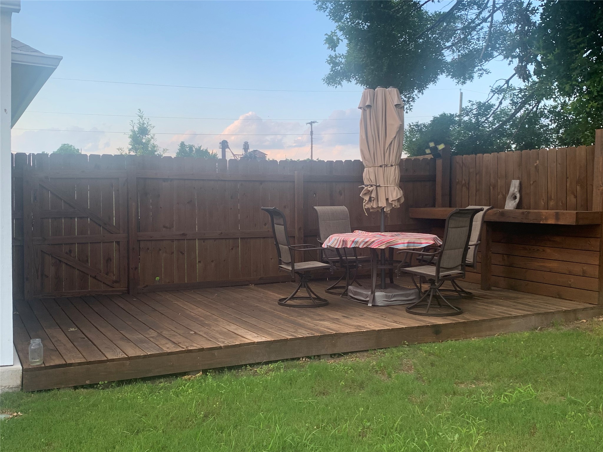 307 West Front Street Thorndale, TX 76577 - Photo 23 of 27 Wooden terrace featuring outdoor dining space
