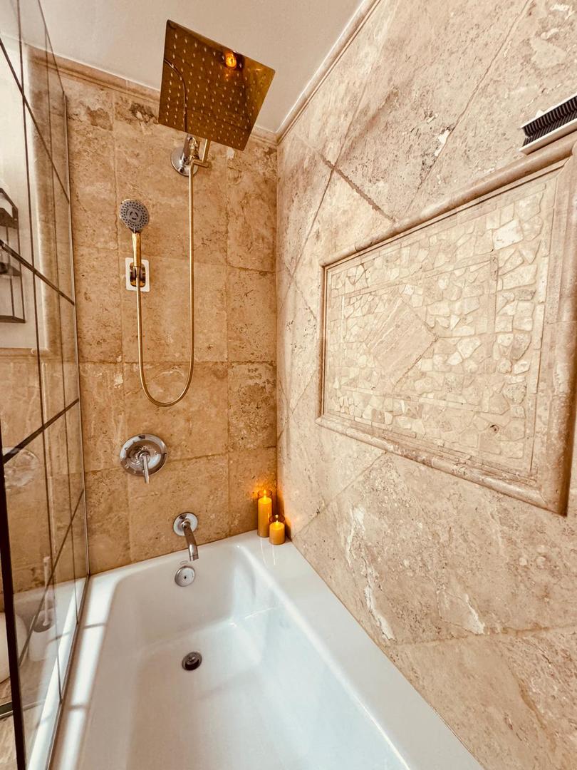 1720 Maple Avenue, Unit 2680 Evanston, IL 60201 - Photo 30 of 74 a bathroom with a sink and a shower