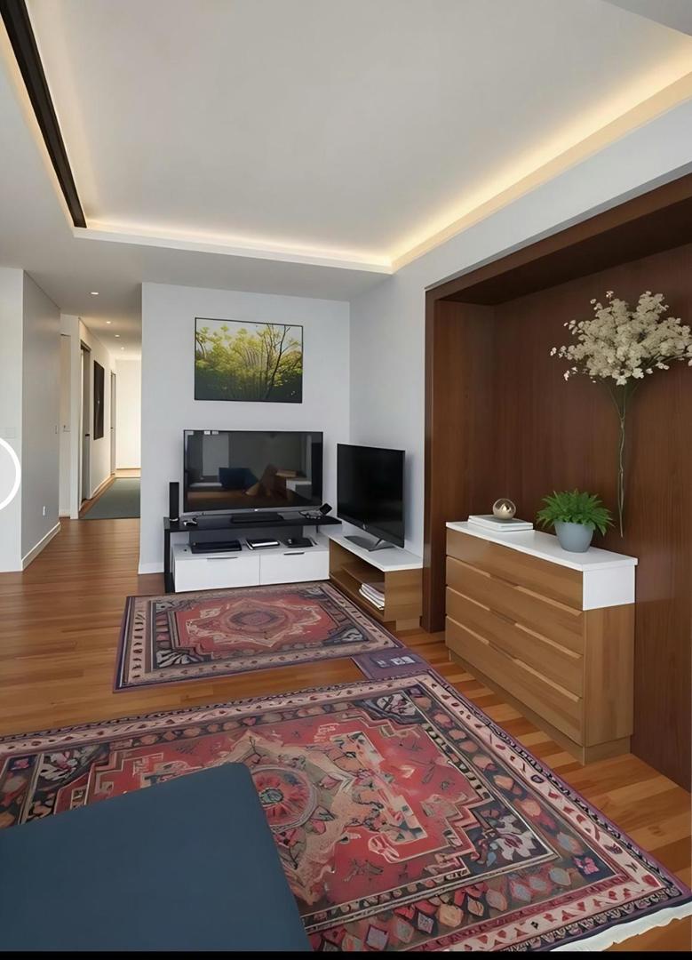 1720 Maple Avenue, Unit 2680 Evanston, IL 60201 - Photo 4 of 74 a living room with furniture and a flat screen tv