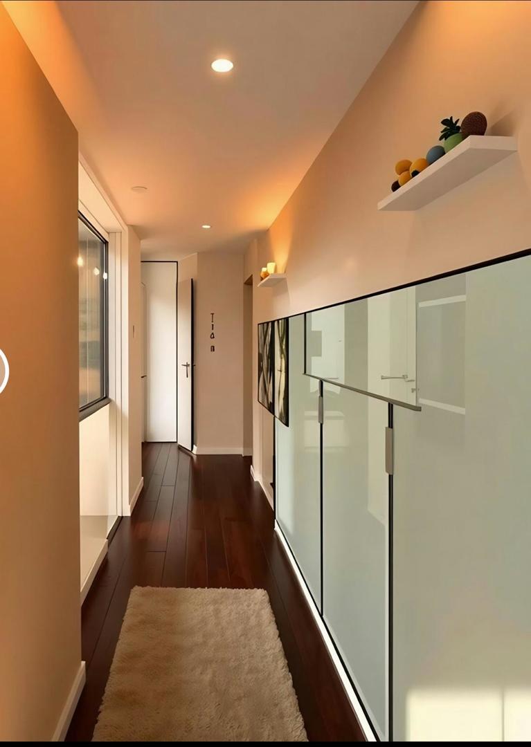 1720 Maple Avenue, Unit 2680 Evanston, IL 60201 - Photo 7 of 74 a view of a hallway with wooden floor and staircase
