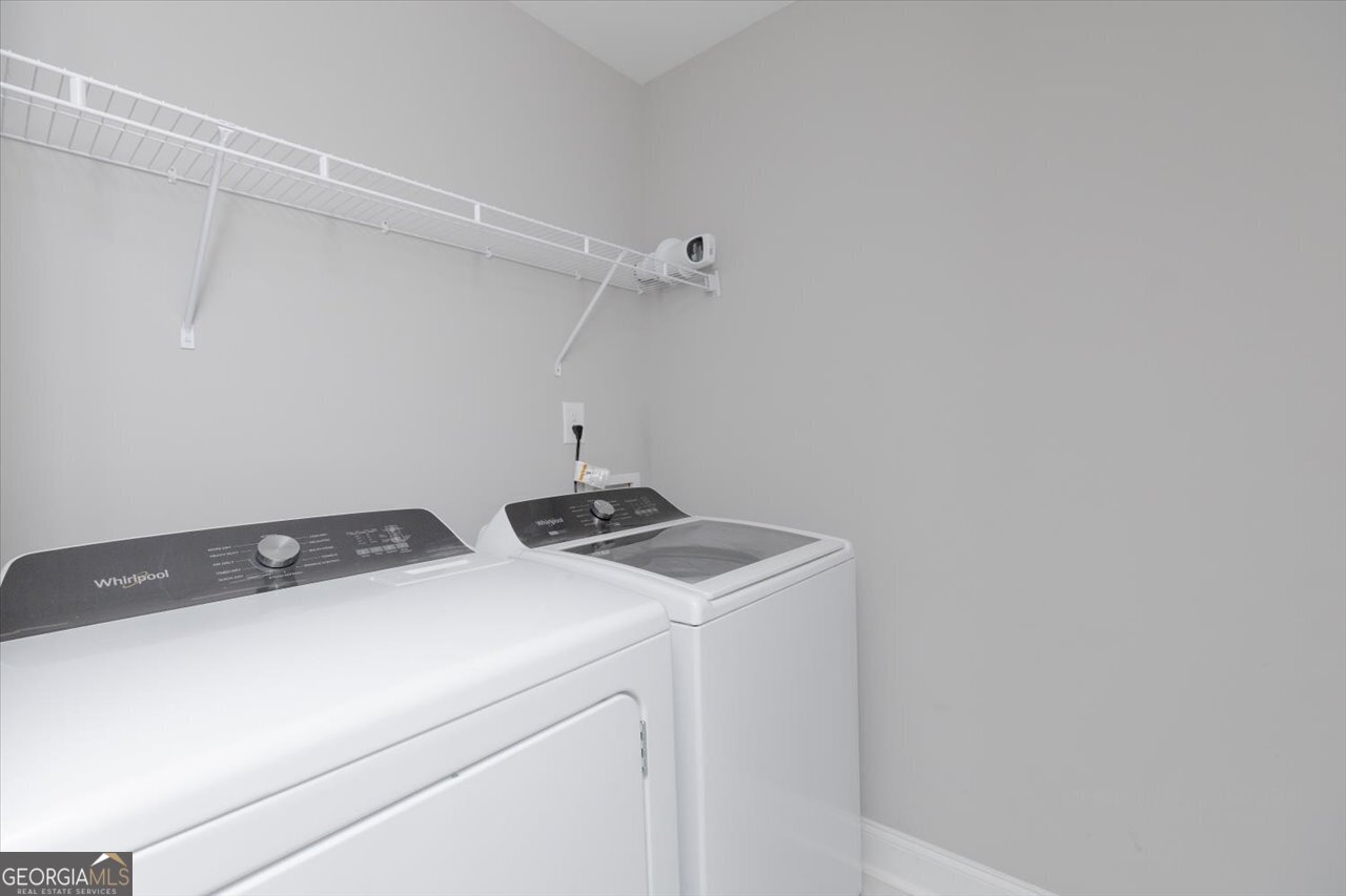 104 Meredith Layne Court Perry, GA 31069 - Photo 38 of 46 a utility room with dryer and washer