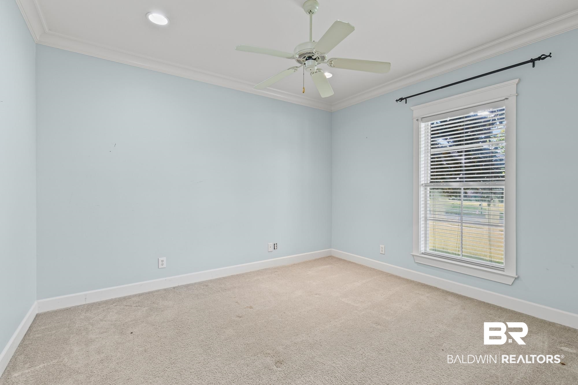 11261 Halcyon Loop Daphne, AL 36526 - Photo 22 of 41 Spacious room featuring light blue walls, plush carpeting, a multi-speed ceiling fan, recessed lighting, and a double-hung window with blinds