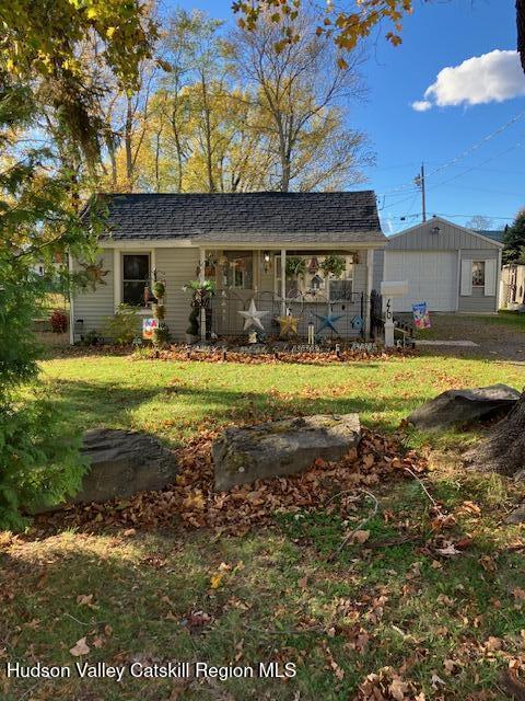 170 Broome Street Catskill, NY 12414 - Photo 17 of 18 a view of a house with swimming pool and a yard
