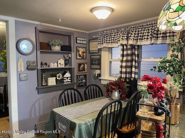 170 Broome Street Catskill, NY 12414 - Photo 4 of 18 a view of a dining room with furniture and chandelier