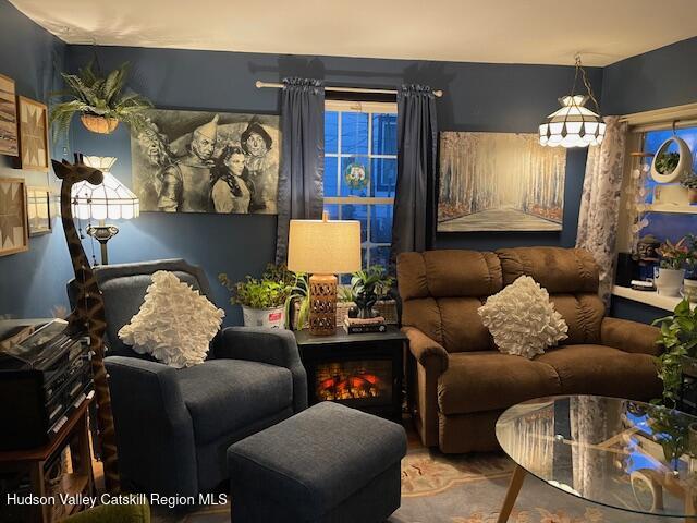 170 Broome Street Catskill, NY 12414 - Photo 6 of 18 a living room with furniture and painting on the wall