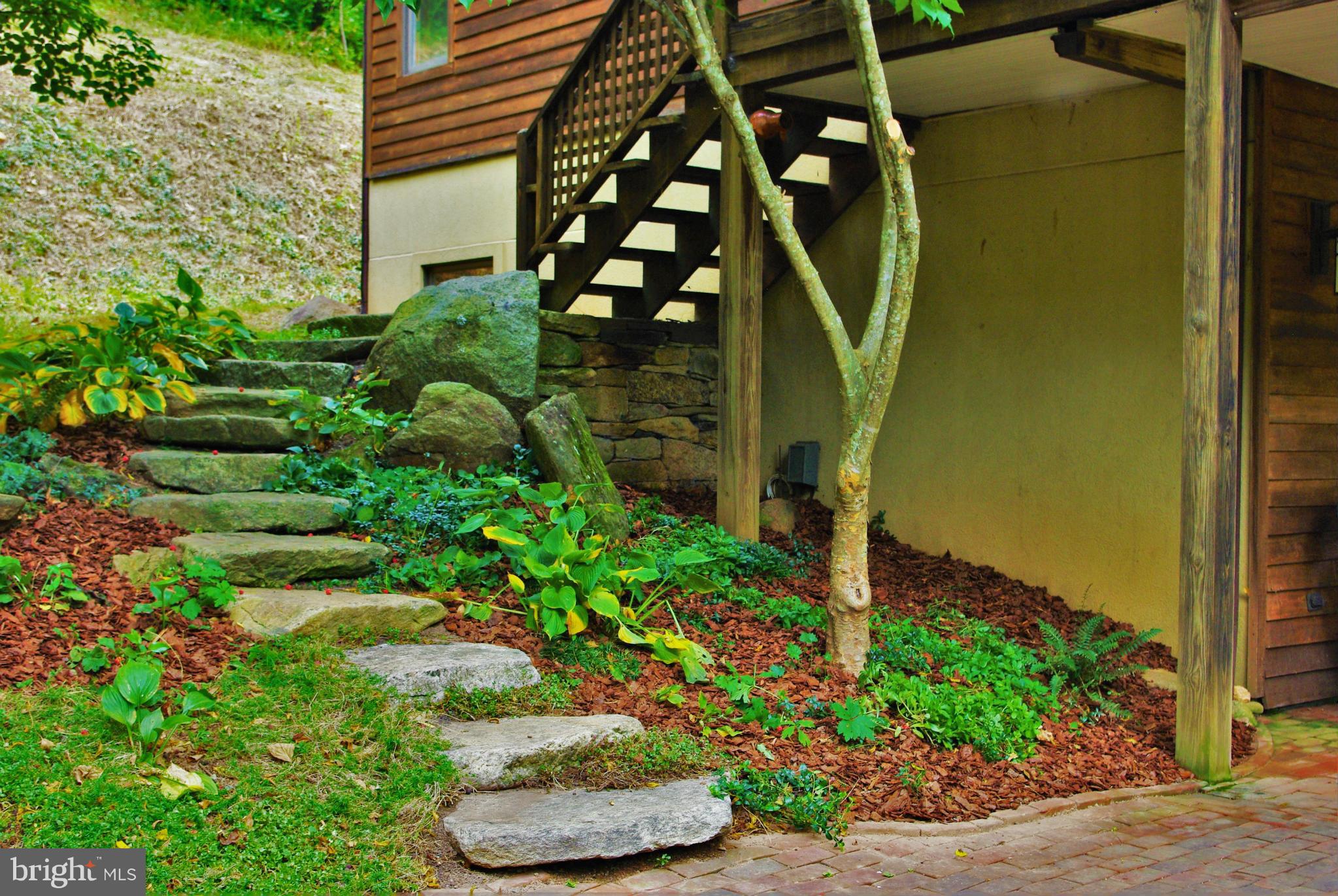 416 Rolling Road Sperryville, VA 22740 - Photo 16 of 25 Stone steps lead to the deck