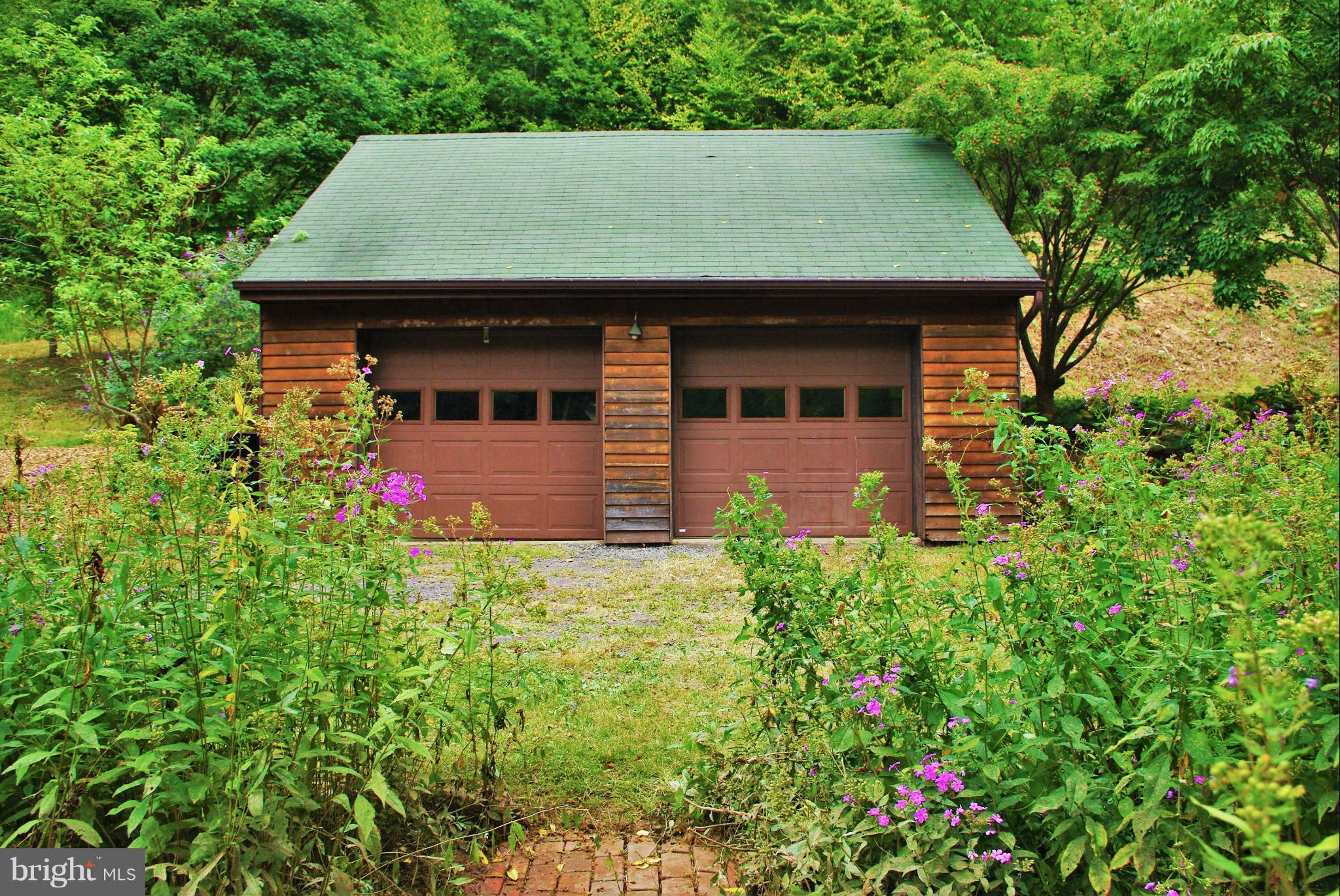 416 Rolling Road Sperryville, VA 22740 - Photo 19 of 25 The garage has electricity and a utility sink