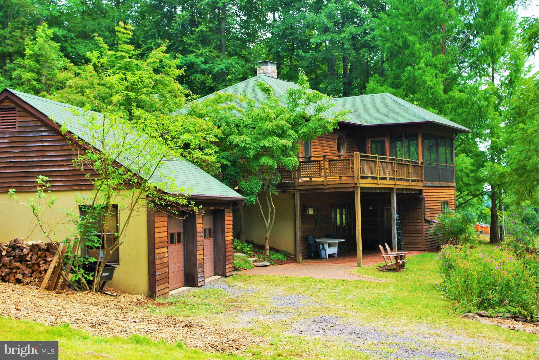 416 Rolling Road Sperryville, VA 22740 - Photo 3 of 25 View of the house and garage