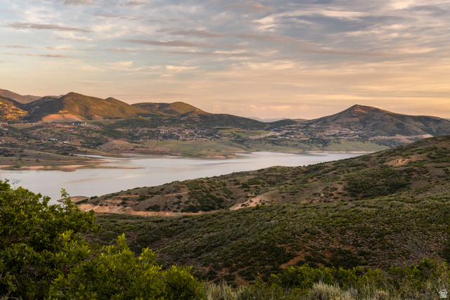 9269 North Sunset Road Kamas, UT 84036 - Photo 7 of 21 Expansive mountainous landscape featuring a large body of water, rolling hillsides, and distant settlements
