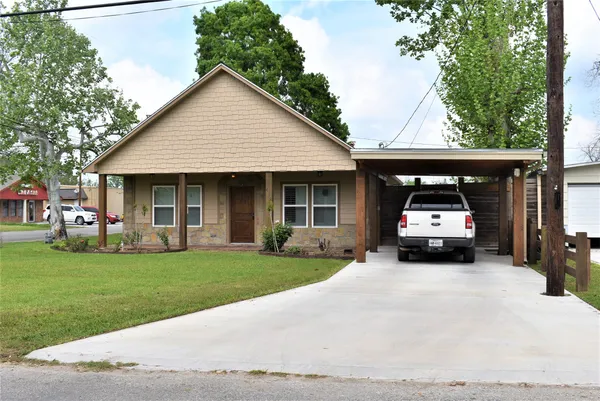 a car parked in front of a house