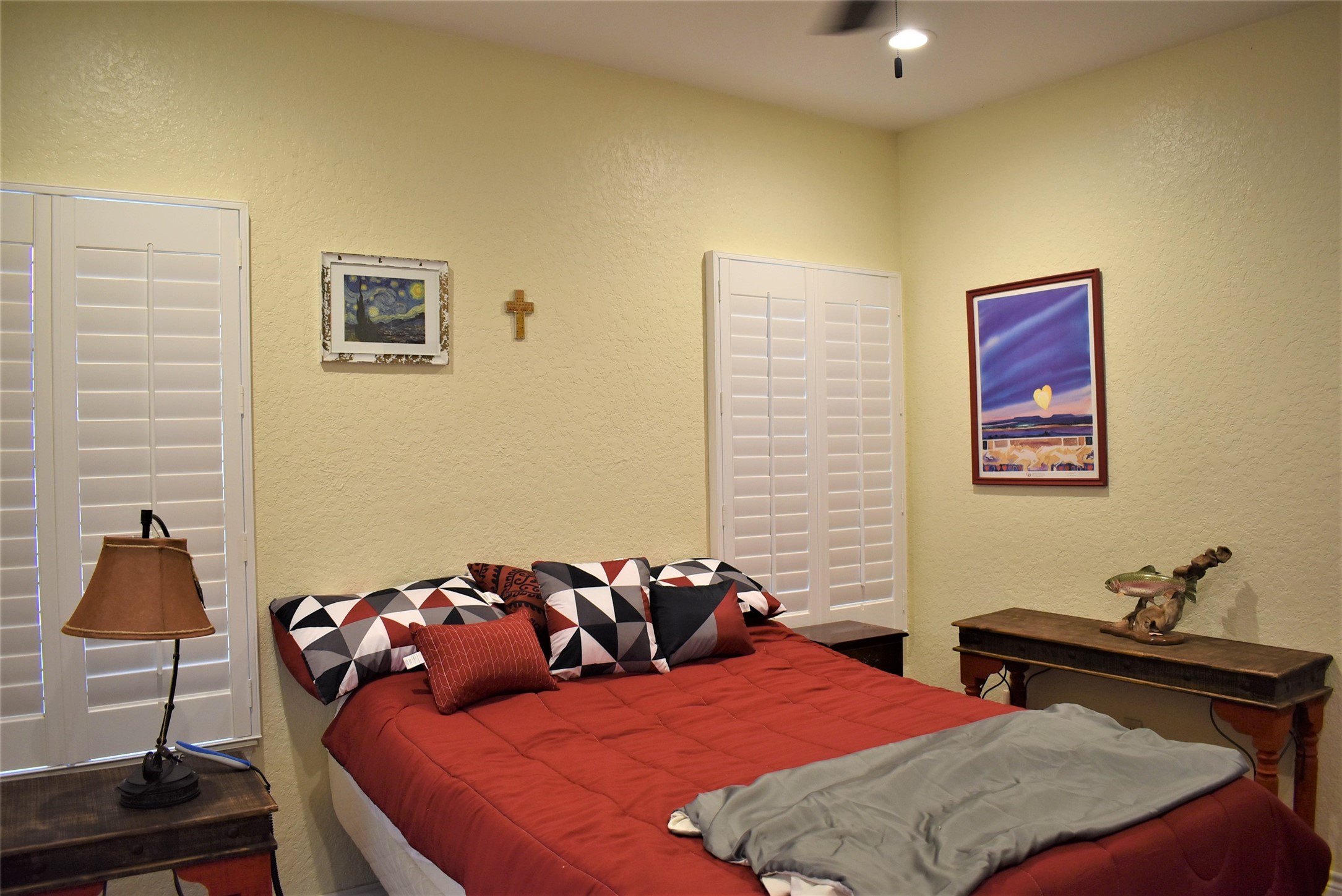 412 Pecan Street Sweeny, TX 77480 - Photo 16 of 32 a bedroom with a bed and a lamp