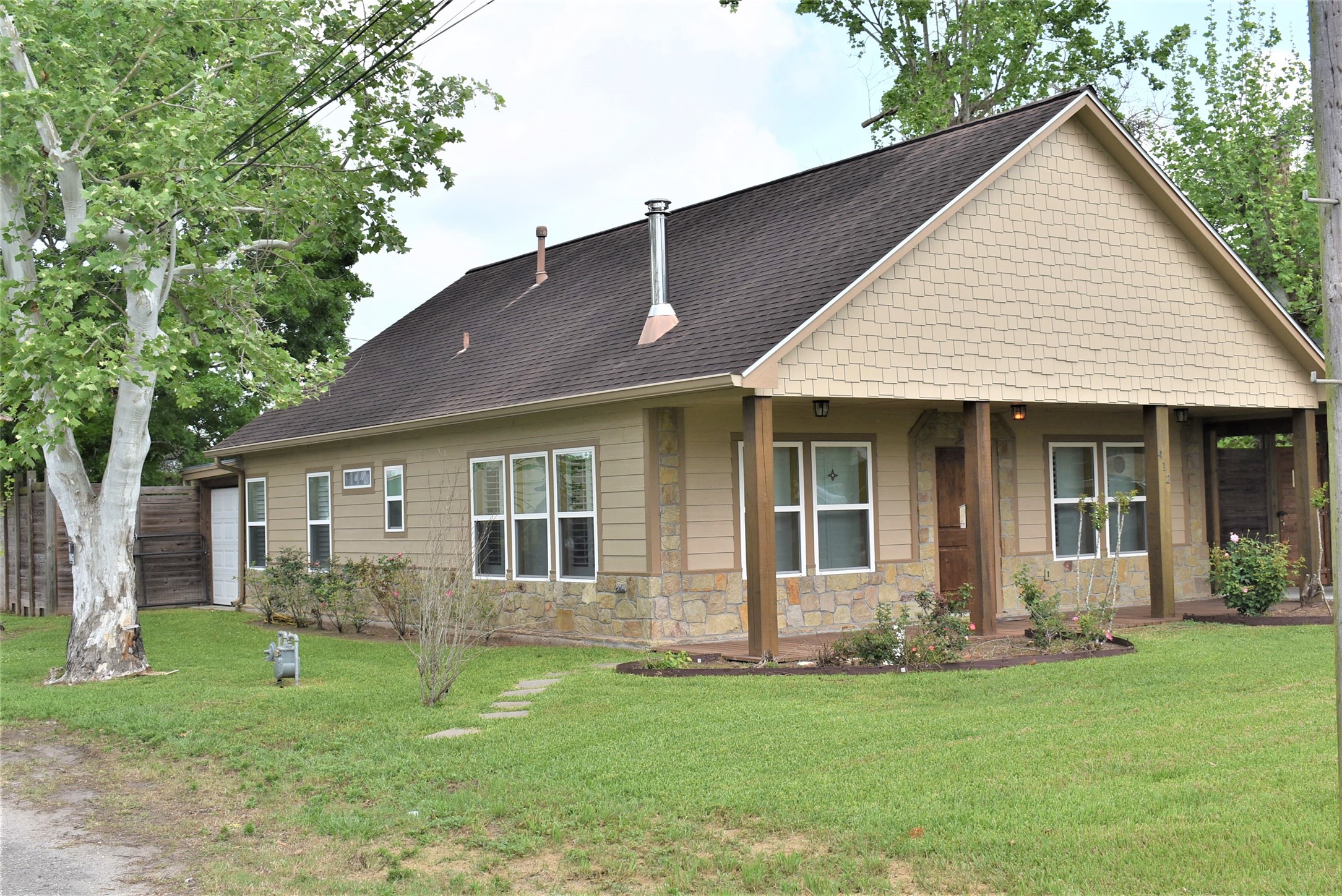 412 Pecan Street Sweeny, TX 77480 - Photo 4 of 32 a view of a house with a yard