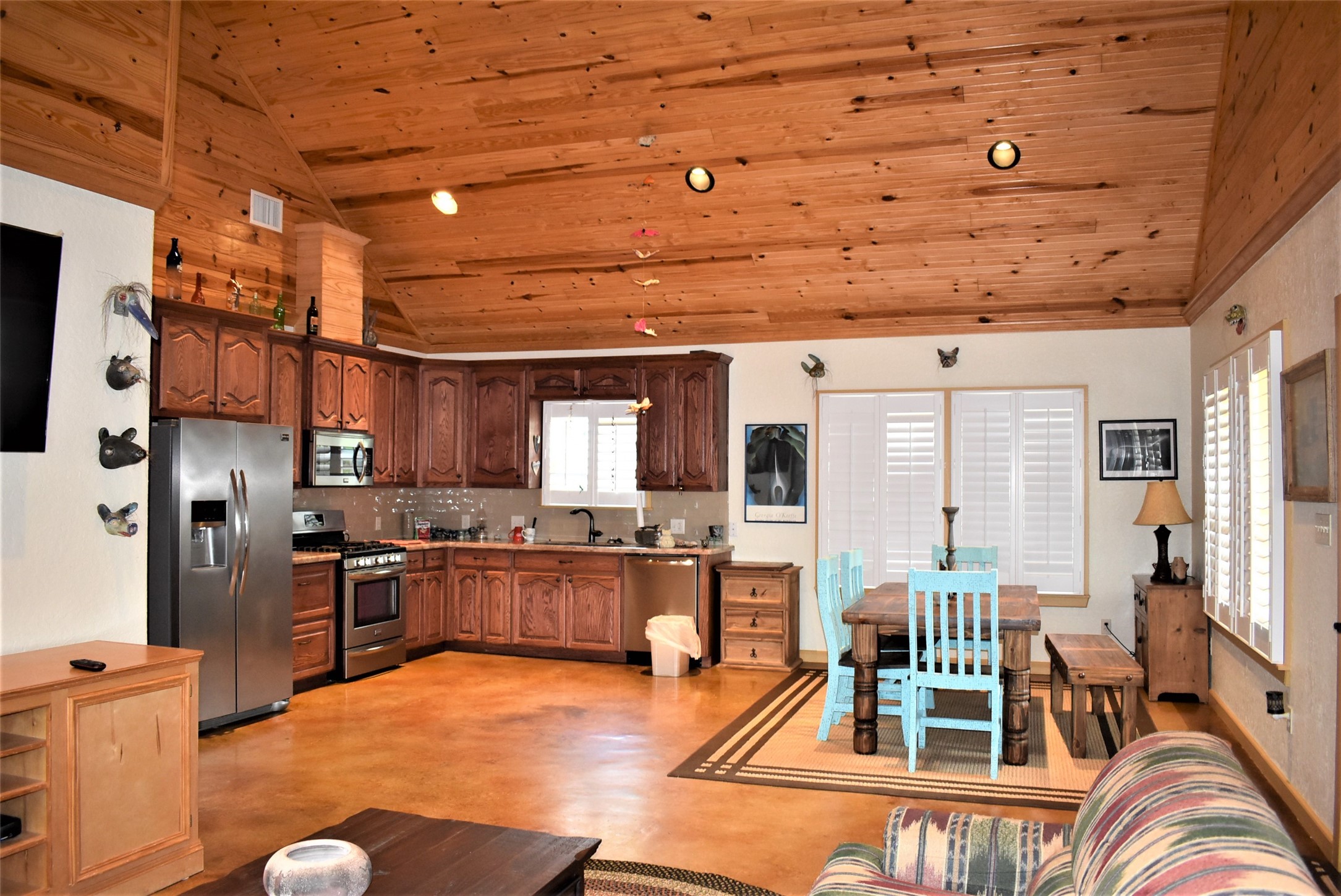412 Pecan Street Sweeny, TX 77480 - Photo 8 of 32 a living room with stainless steel appliances kitchen island granite countertop furniture and a kitchen view