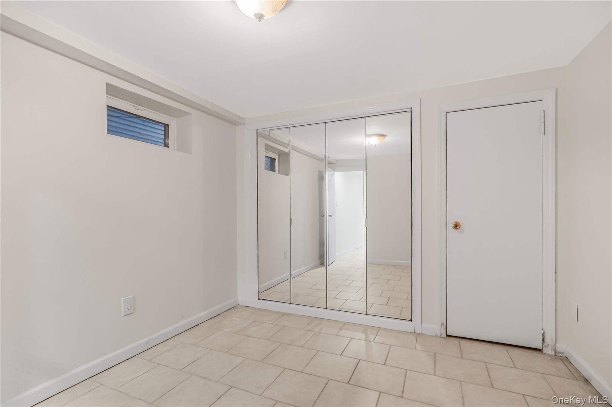 243-25 132nd Road Queens, NY 11422 - Photo 20 of 41 a view of an empty room