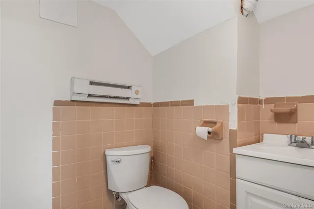 a view of an empty room with glass door