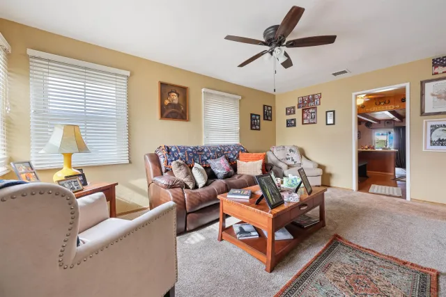 a living room with furniture and a window