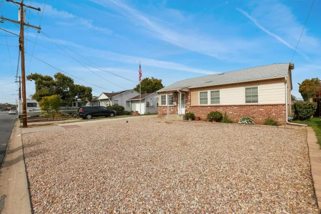 a view of house with a street