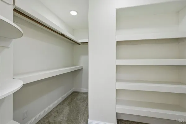 a view of an empty walk in closet