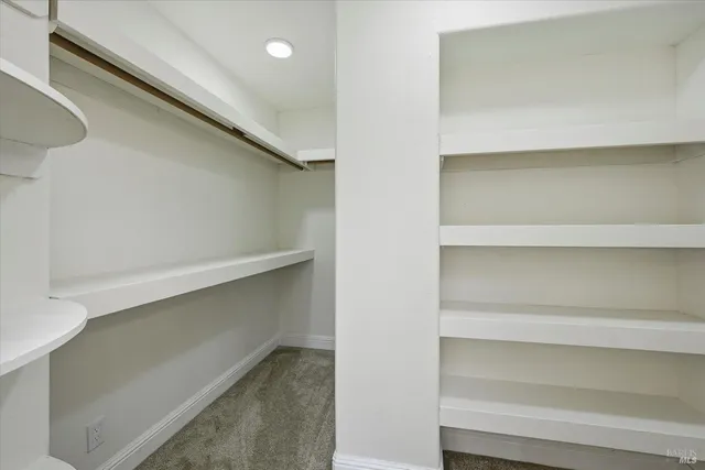 a view of an empty walk in closet