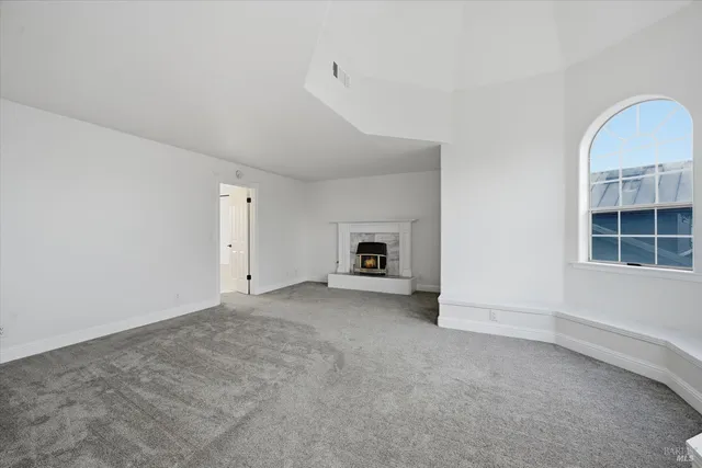 a view of a hallway with a window