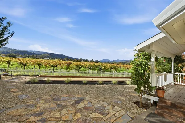 a view of an empty room with stairs