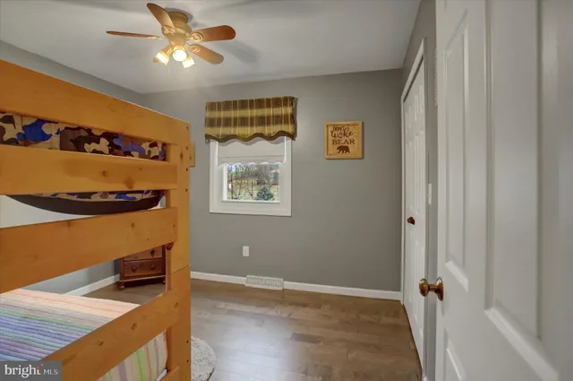 a view of a kitchen cabinets and wooden floor