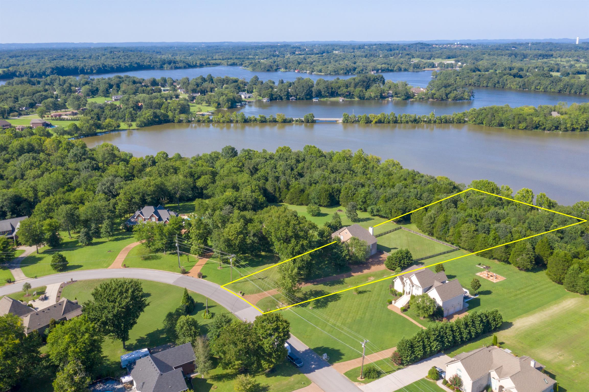Gorgeous setting for this executive style home w/ 4 br/3. 5 baths/3687 sf and a rare FOUR car garage!