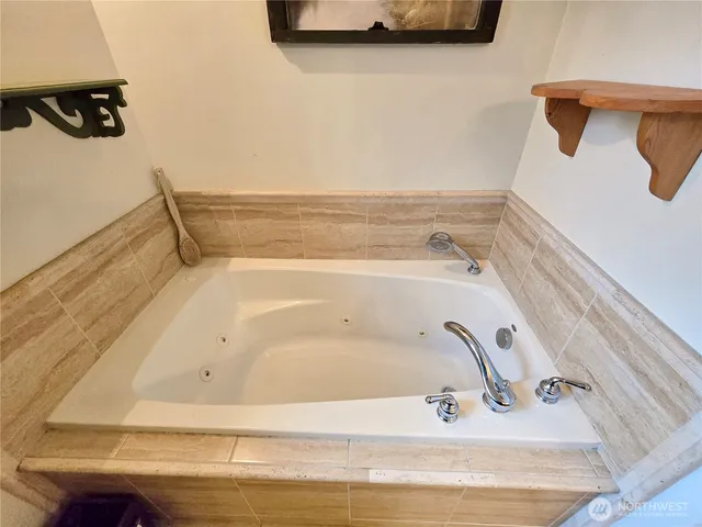 a bathroom with a bathtub