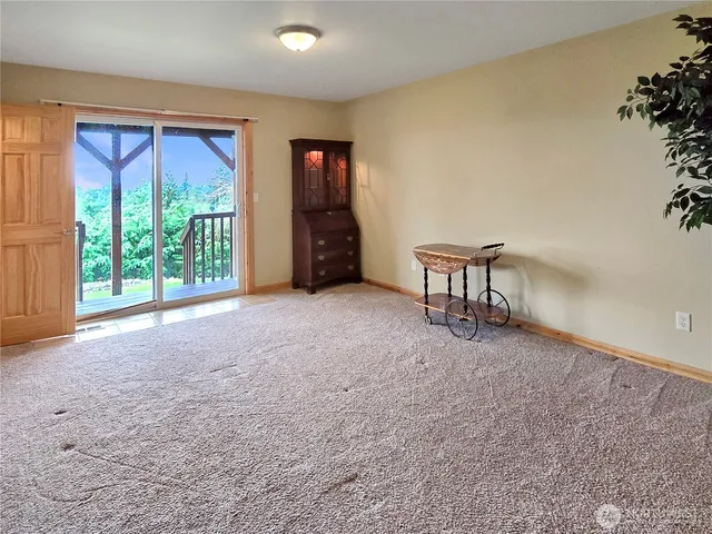 a view of workspace with furniture and window