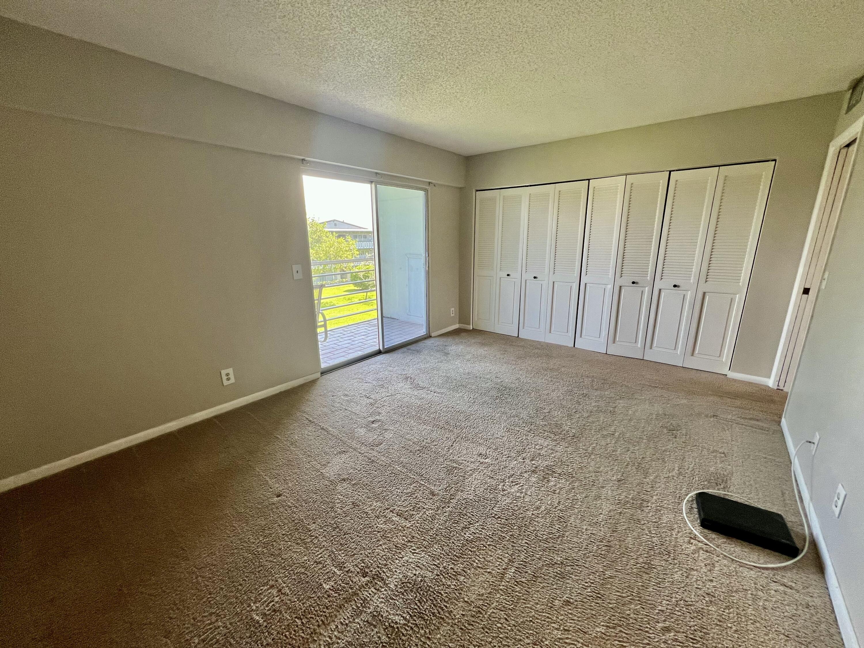 209 Suffolk F Boca Raton, FL 33434 - Photo 22 of 25 Spacious Bedroom