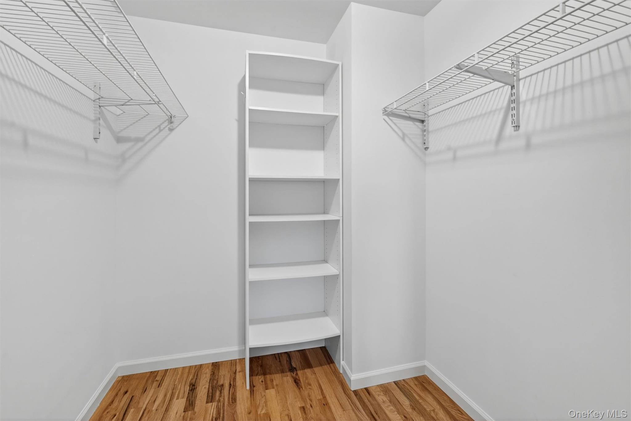 954 Ridgebury Road New Hampton, NY 10958 - Photo 26 of 45 A generous walk-in closet off of the first foor bedroom gives this bedroom the kind of everyday storage that keeps life feeling organized and easy.