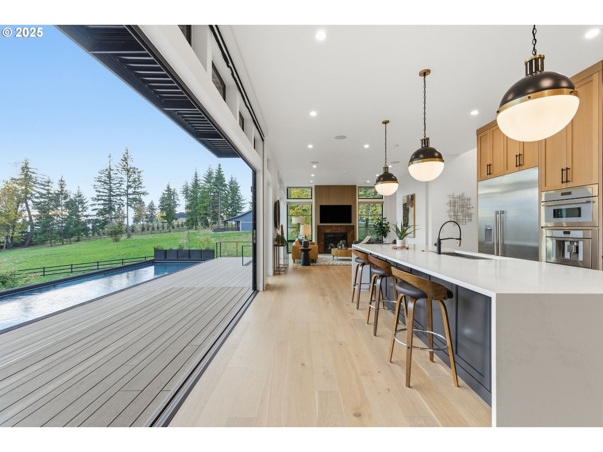 15299 Northeast Quarry Road Newberg, OR 97132 - Photo 12 of 46 a large kitchen with a table and chairs