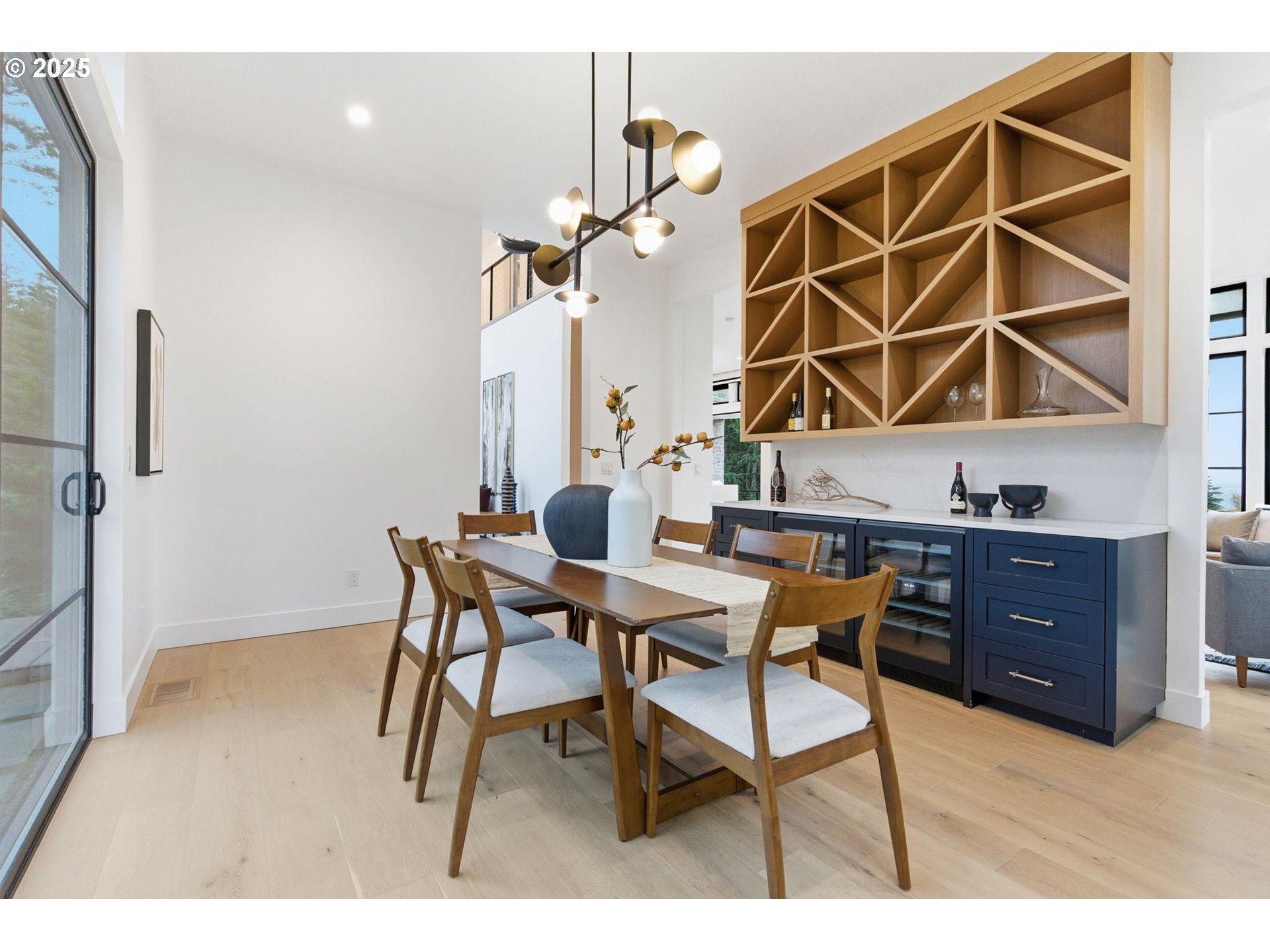 15299 Northeast Quarry Road Newberg, OR 97132 - Photo 22 of 46 a dining room with a wooden table and chairs