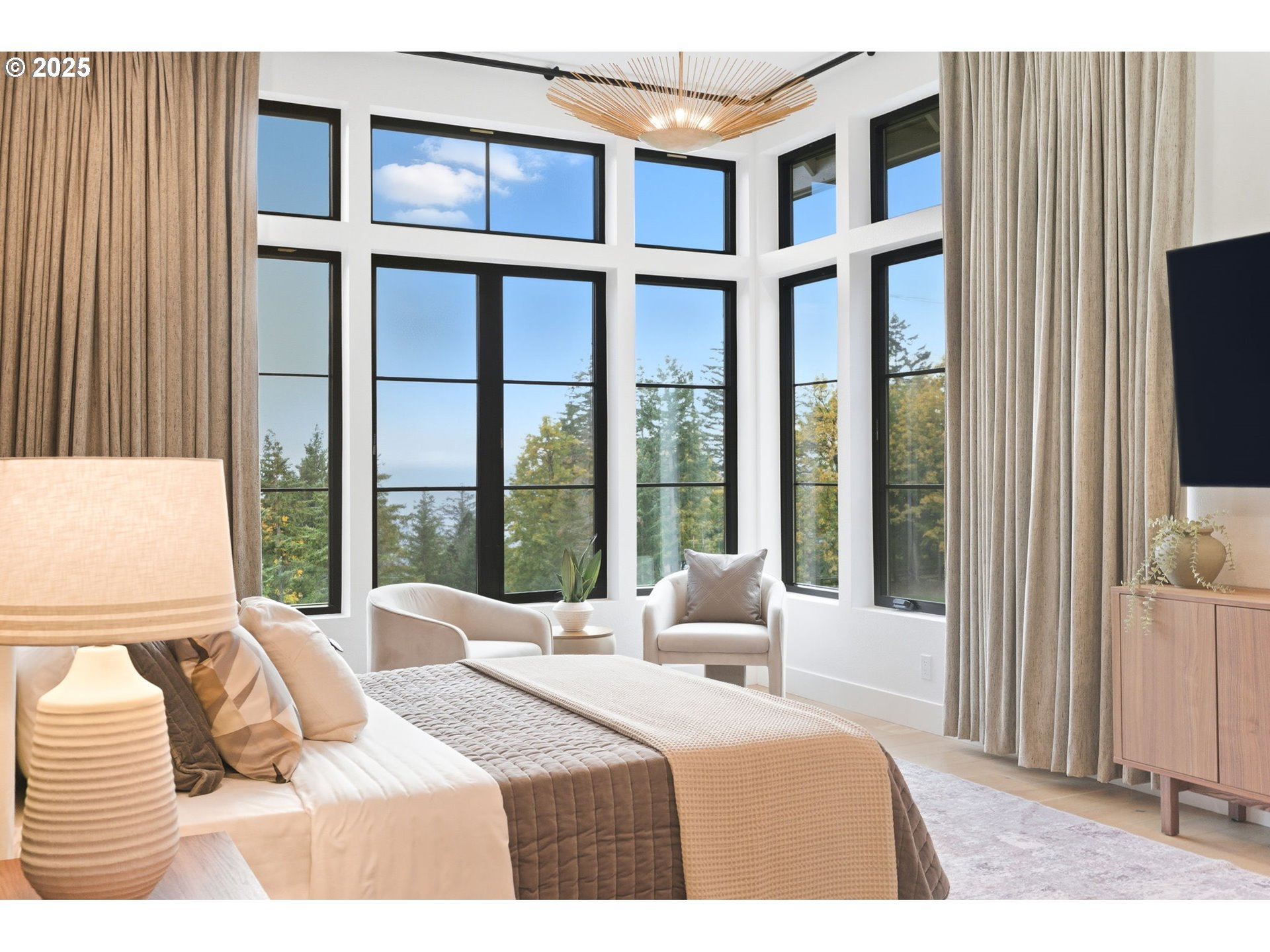 15299 Northeast Quarry Road Newberg, OR 97132 - Photo 29 of 46 a bedroom with a large bed and a large window
