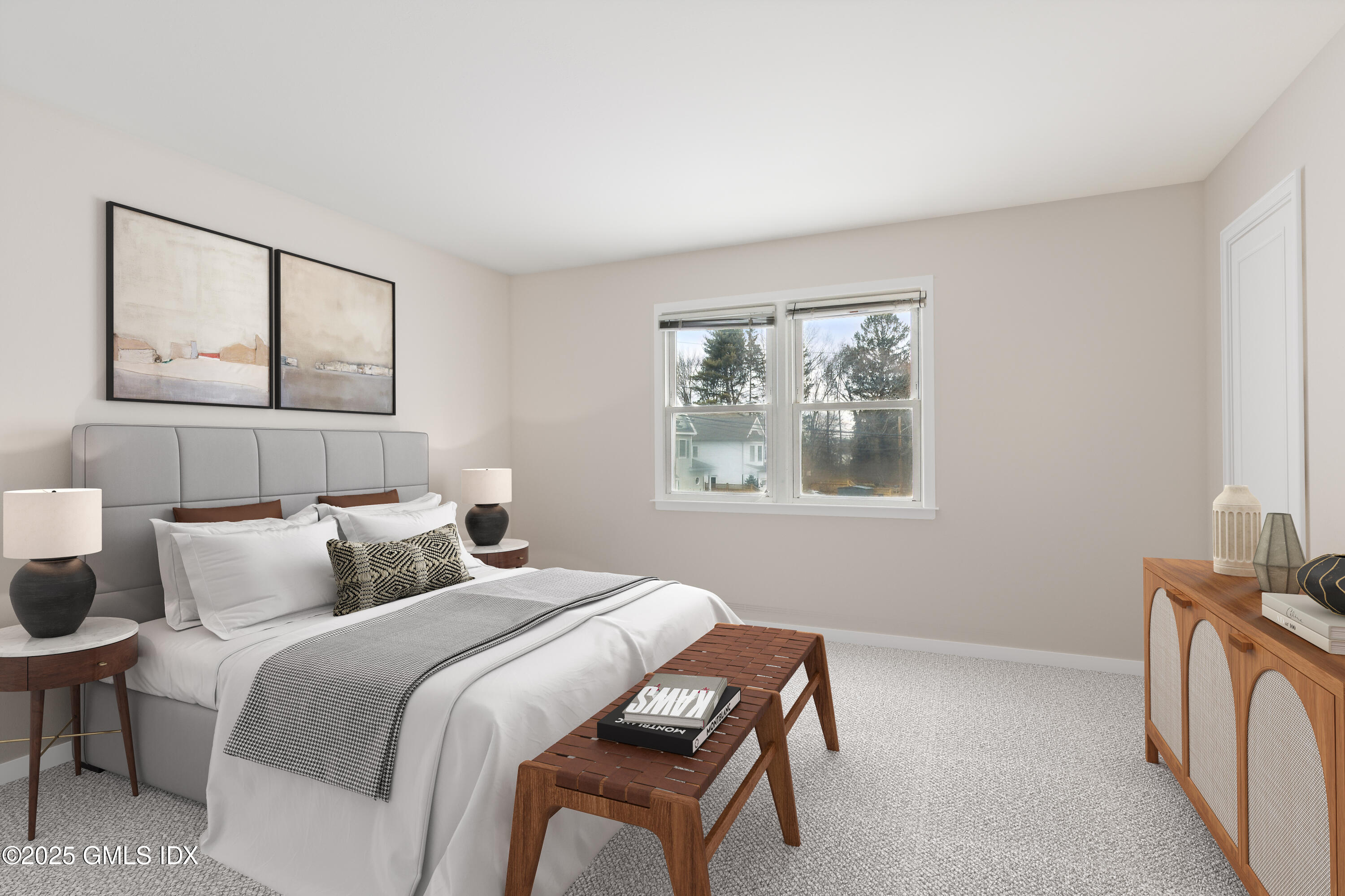 15 Neil Lane, Unit 2 Riverside, CT 06878 - Photo 5 of 10 a bedroom with a bed and a window