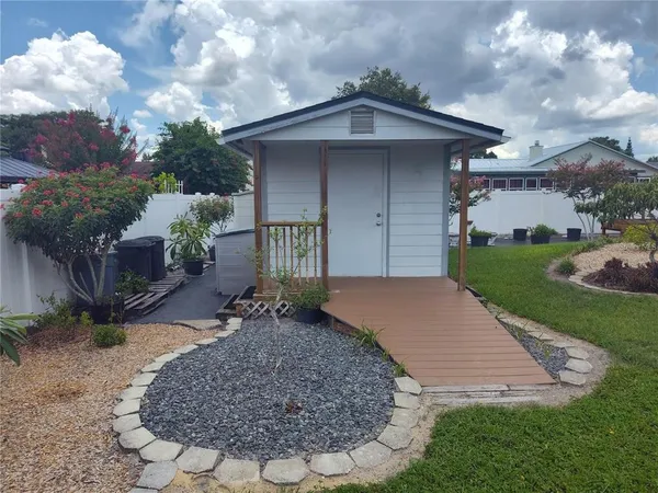 a view of a garden with a slide