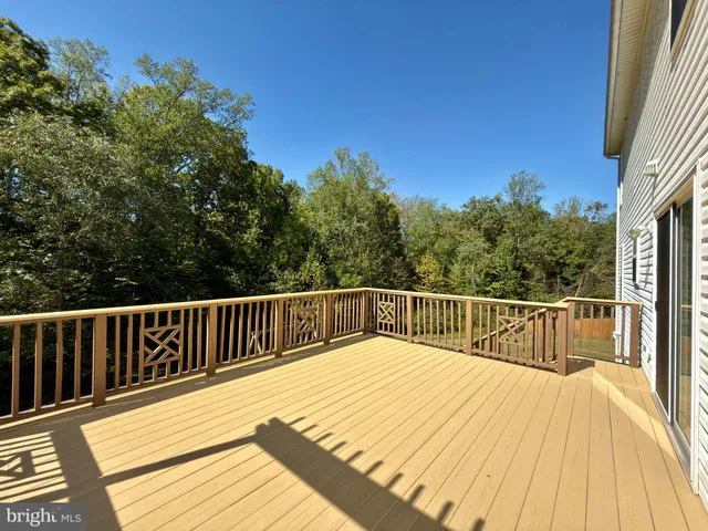 a view of balcony with furniture