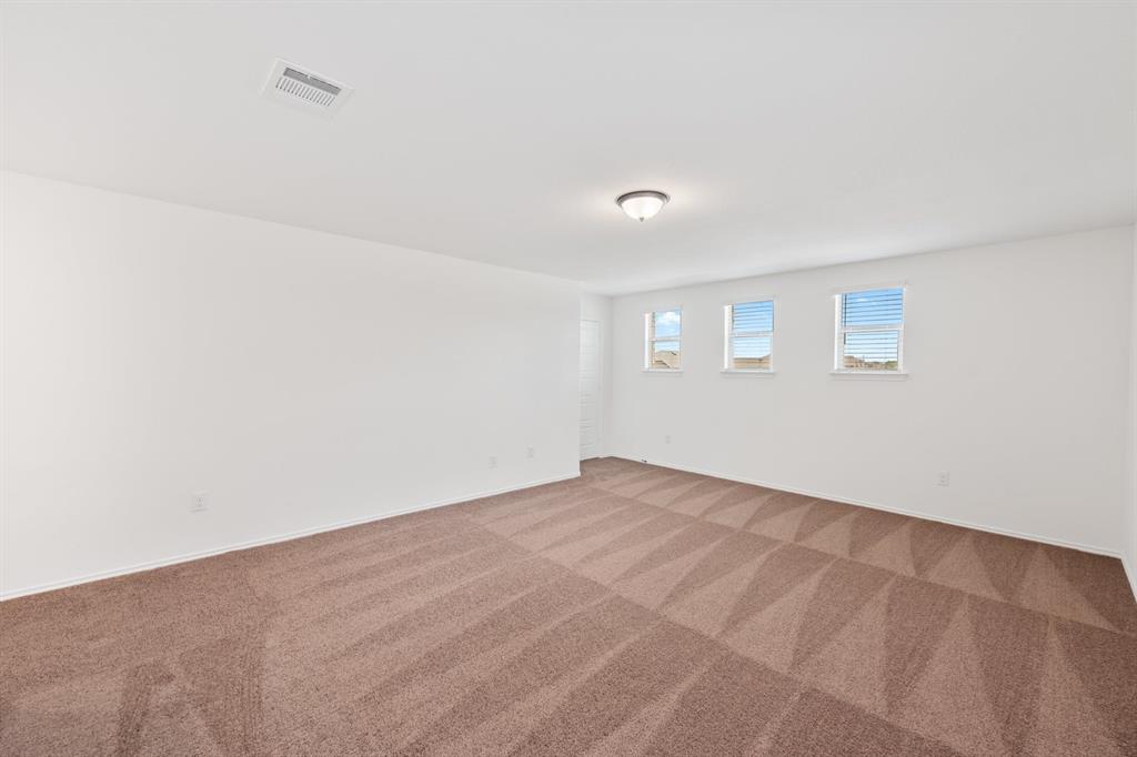 210 McGinnis Trail Kyle, TX 78640 - Photo 10 of 10 a view of an empty room with a window