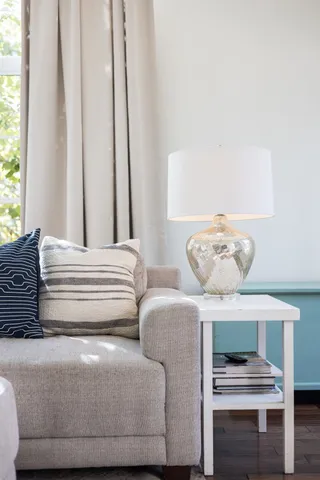 a view of walk in closet with clothes