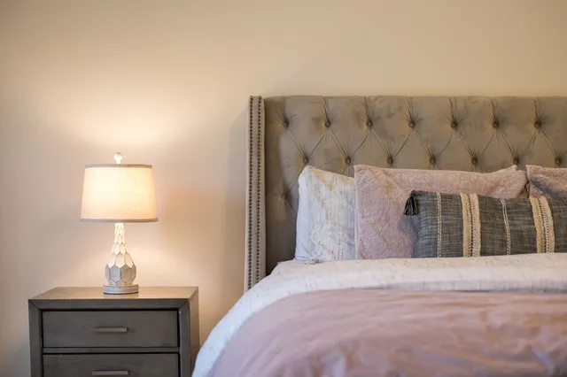 a spacious bathroom with a double vanity sink and a mirror