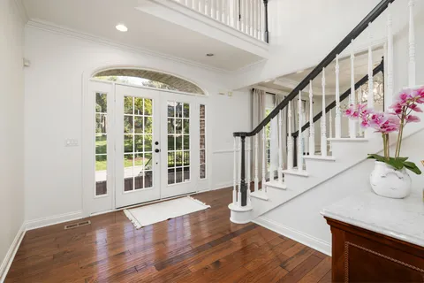 a bed room with a bed and a window