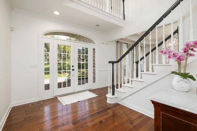 a bed room with a bed and a window