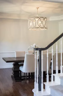 a kitchen with stainless steel appliances kitchen island granite countertop a refrigerator and a stove top oven