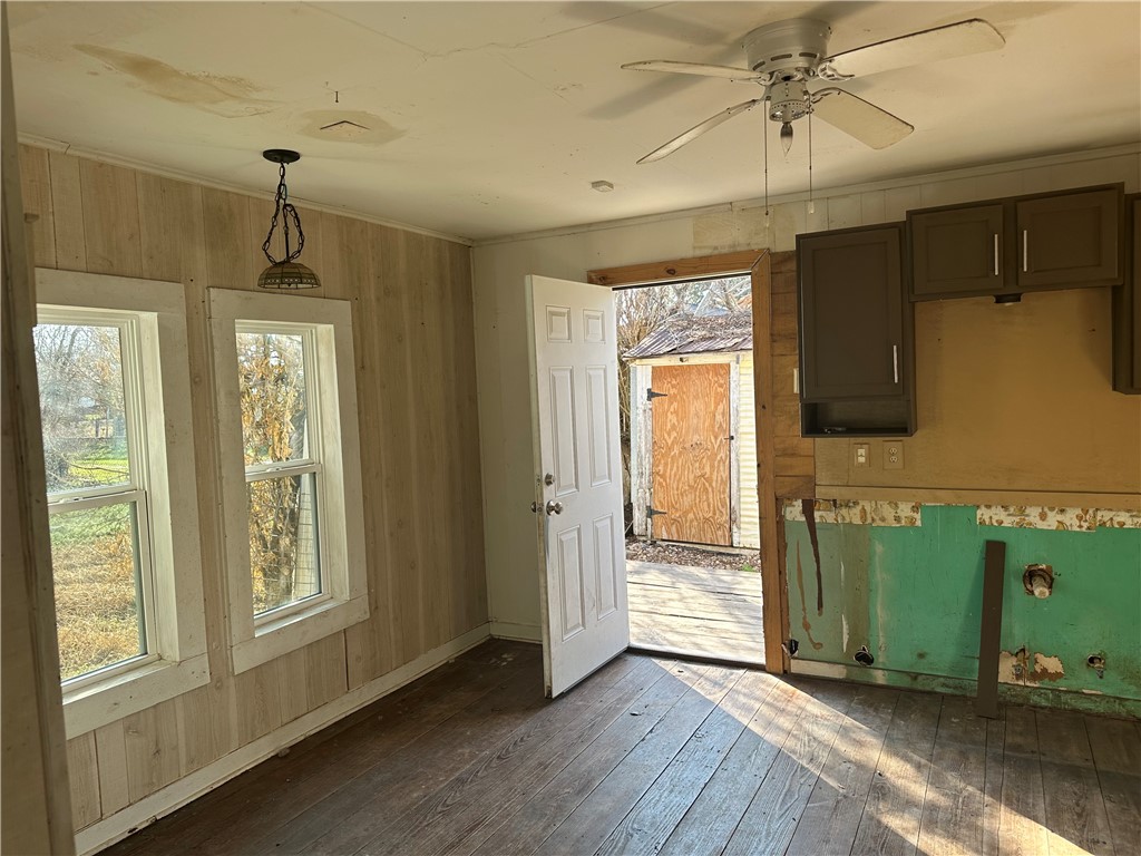 308 Mc Guill Street Refugio, TX 78377 - Photo 12 of 28 a view of a livingroom with wooden floor and windows