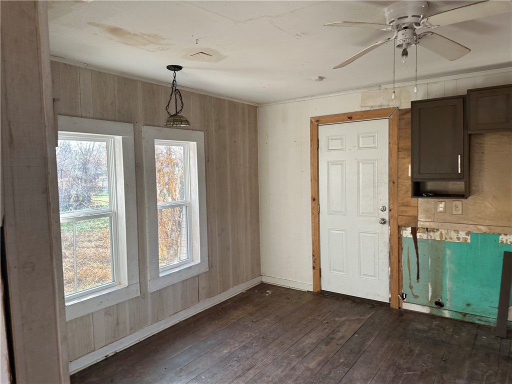 308 Mc Guill Street Refugio, TX 78377 - Photo 15 of 28 an empty room with ceiling fan and windows