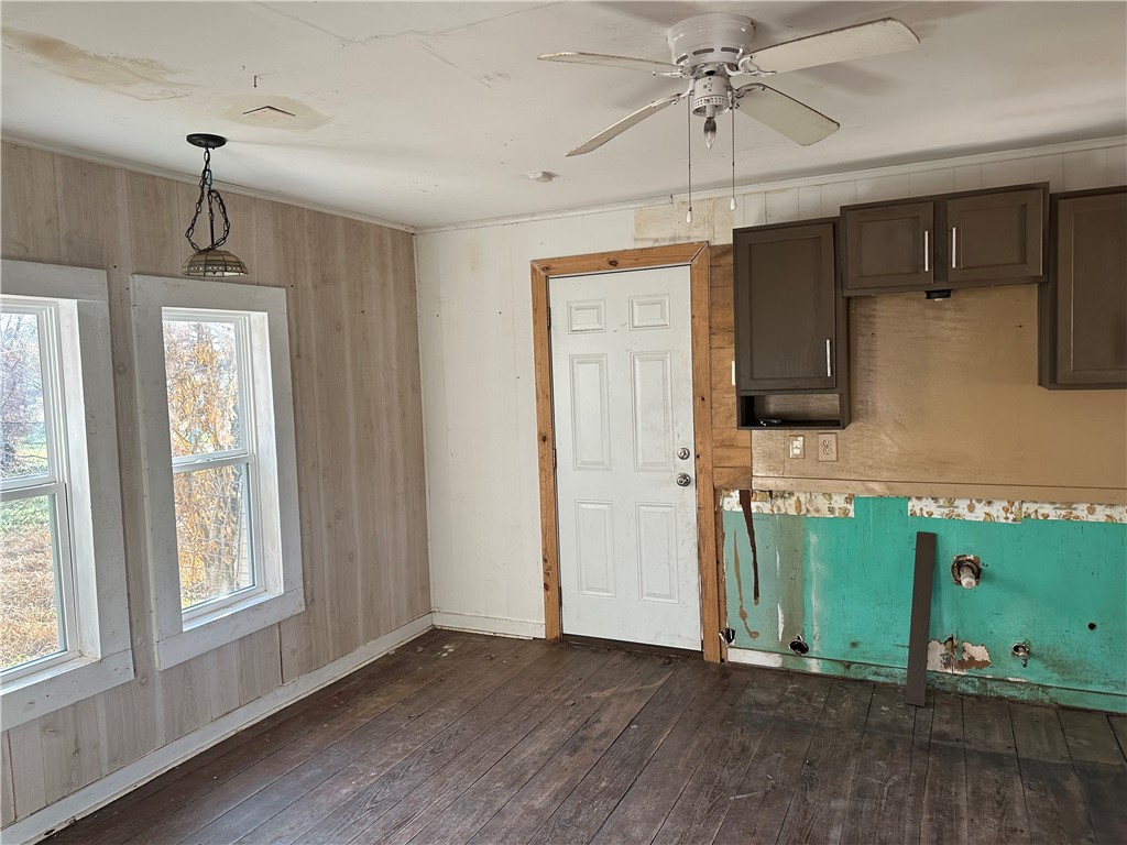 308 Mc Guill Street Refugio, TX 78377 - Photo 16 of 28 an empty room with windows and ceiling fan