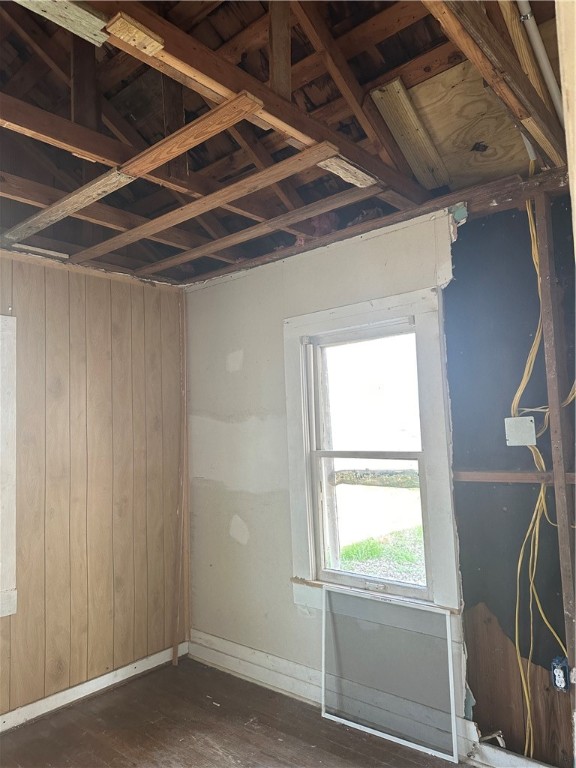 308 Mc Guill Street Refugio, TX 78377 - Photo 17 of 28 a view of a room with wooden floor and windows