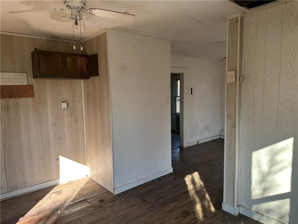 308 Mc Guill Street Refugio, TX 78377 - Photo 21 of 28 a view of a hallway with entryway wooden floor and front door