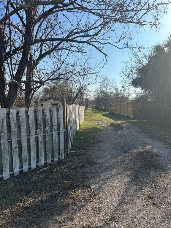 308 Mc Guill Street Refugio, TX 78377 - Photo 27 of 28 a view of a yard with wooden fence