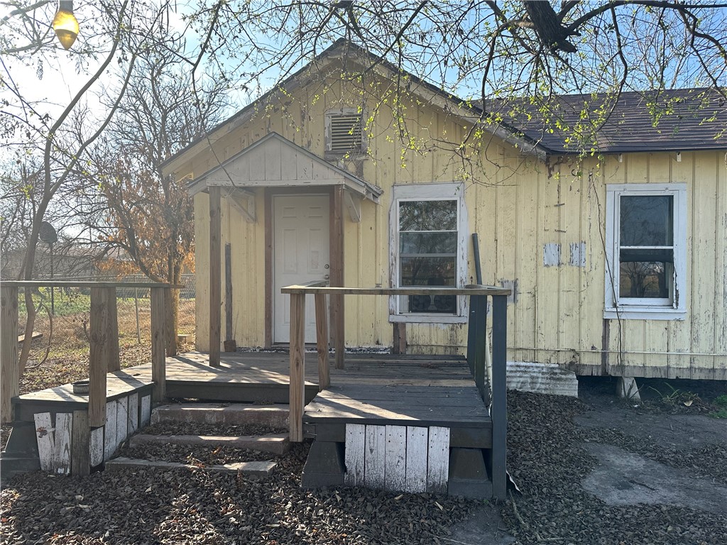 308 Mc Guill Street Refugio, TX 78377 - Photo 5 of 28 a front view of a house with wooden fence